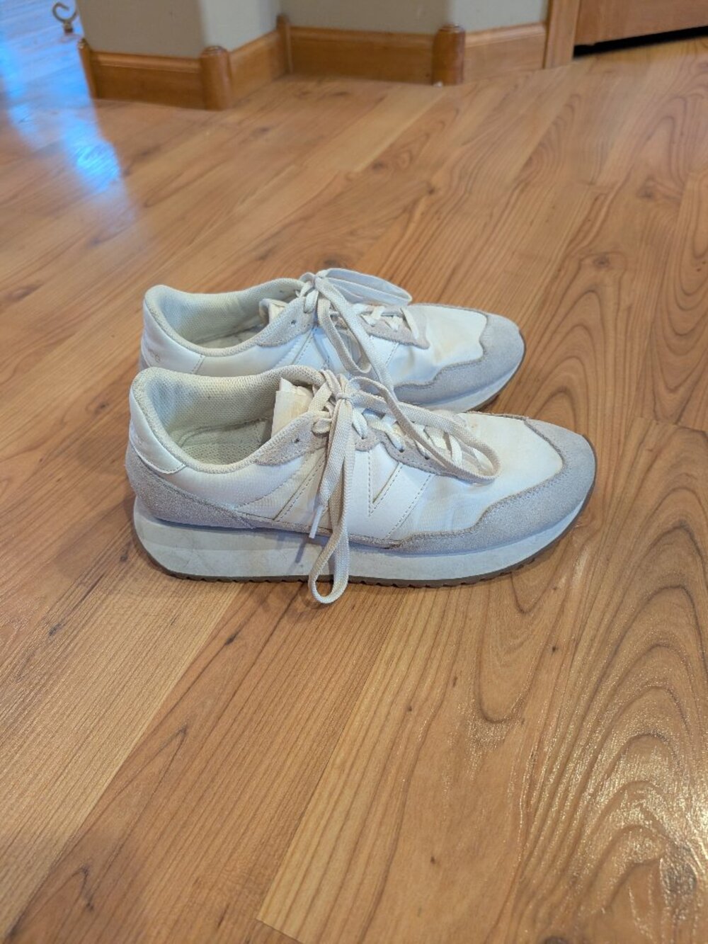 White New Balance 237s